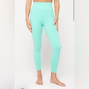 NWT Athleta Salutation Stash Pocket Leggings 7/8 length size medium teal blue